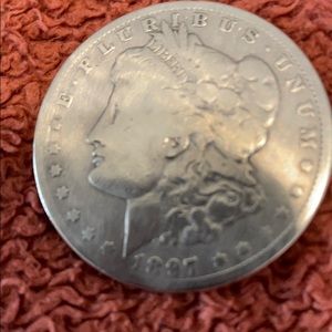 1897 Morgan silver dollar